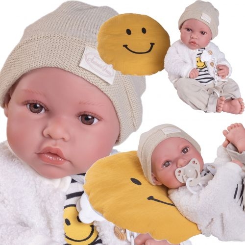 Lalka Hiszpańska 42 cm Antonio Juan 50423 Erik, bobas cały z winylu, chłopiec, bez włosów, rzęsy, w ubranku, poduszka Smile, smoczek