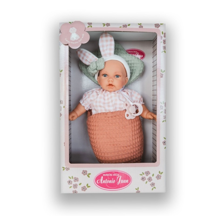 Lalka Hiszpańska 27 cm Antonio Juan 12442 Petit, bobas miękki brzuszek, bez włosów, namalowane rzęsy, w ubranku, smoczek, śpiworek w kształcie marchewki