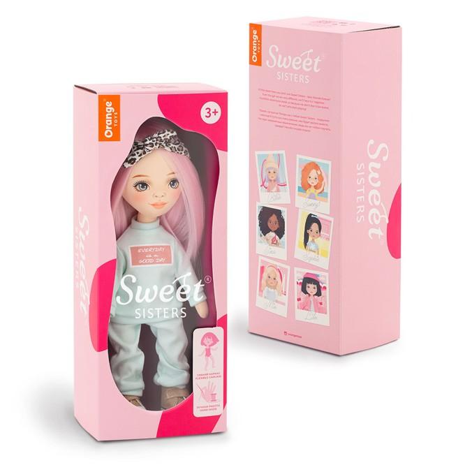 Lalka Sweet Sisters Bilie 32 cm Orange Toys, szmaciana z endoszkieletem, twarz nadrukowana cyfrowo, różowe włosy, dwuczęściowy miętowy dresik, opaska na głowę, buciki