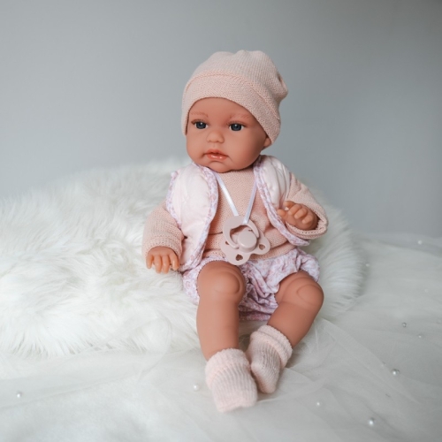 Lalka Hiszpańska 34 cm Antonio Juan 70364 Baby Toneta, bobas, elastyczny tułów, miękki brzuszek, w ciele stelaż, który pozwala na zmianę pozycji, w ubranku, smoczek, poduszka