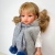 Lalka Hiszpańska 33 cm Antonio Juan 25297 Emily, klasyczna, cała z winylu, w ubranku, blond włosy z grzywką, rzęsy