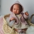 Lalka Hiszpańska 43 cm ASI 0367850 Maria, bobas bez włosów, z rzęsami, cała z winylu, dziewczynka, w ubranku, odkręcana buteleczka