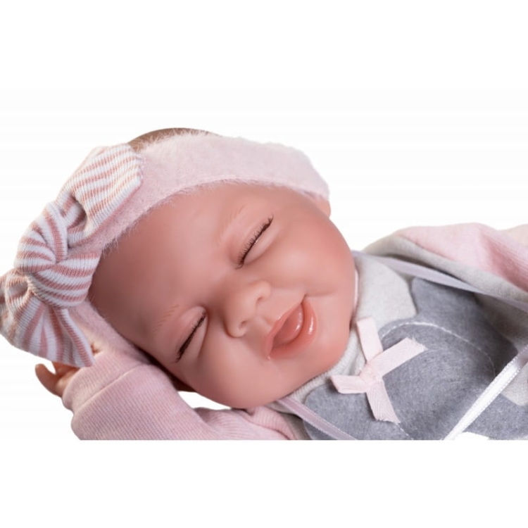 Lalka Hiszpańska 34 cm Antonio Juan 70401 śpiąca Lluna Posturitas, bobas, miękki brzuszek, oczy zamknięte na stałe, w ciele stelaż, który pozwala na zmiany pozycji, w ubranku, smoczek
